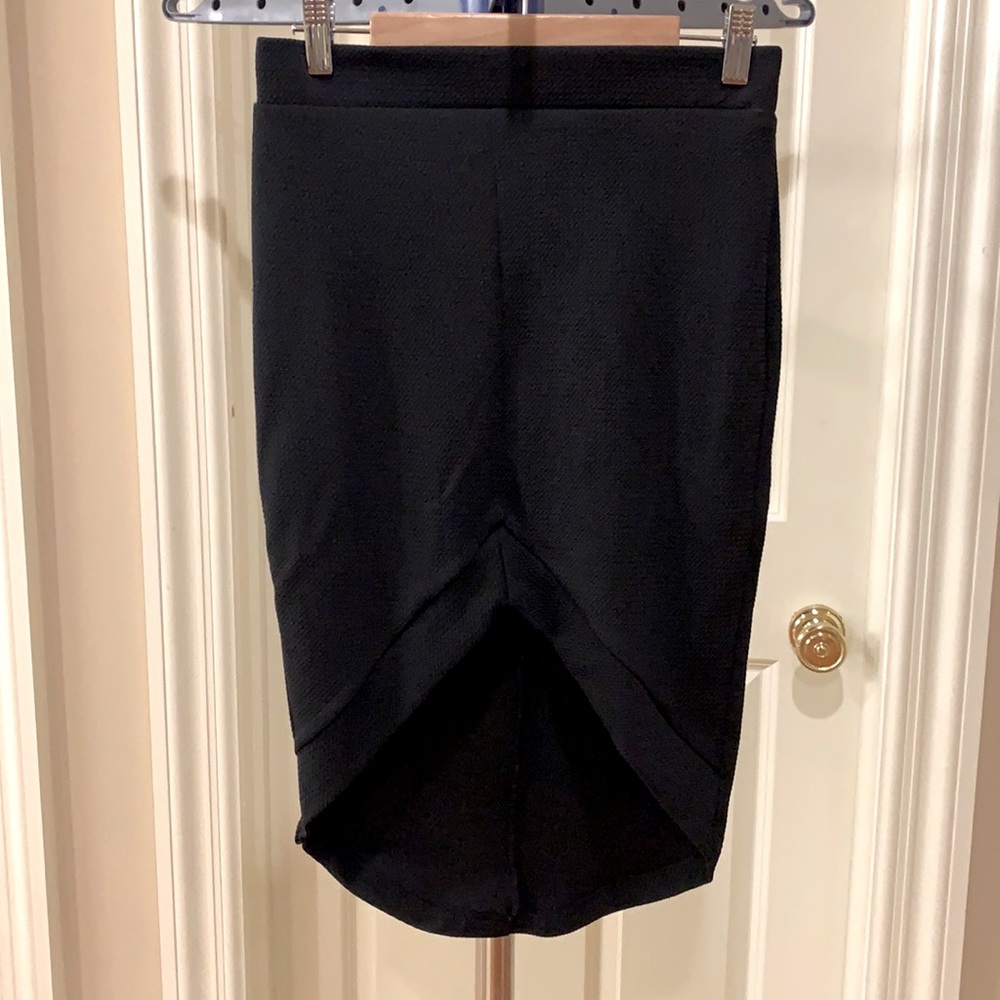 Bodycon high-low black skirt.